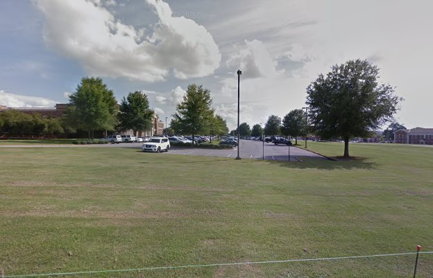 Lot B - recognizable features include the College of Community Health Sciences building adjacent to the surface lot