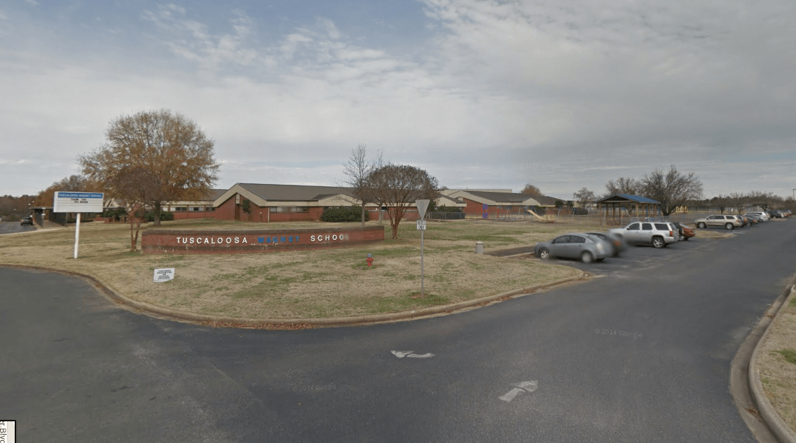 Tuscaloosa Magnet School - recognizable features include a low brick wall with "Tuscaloosa Magnet School" written on it
