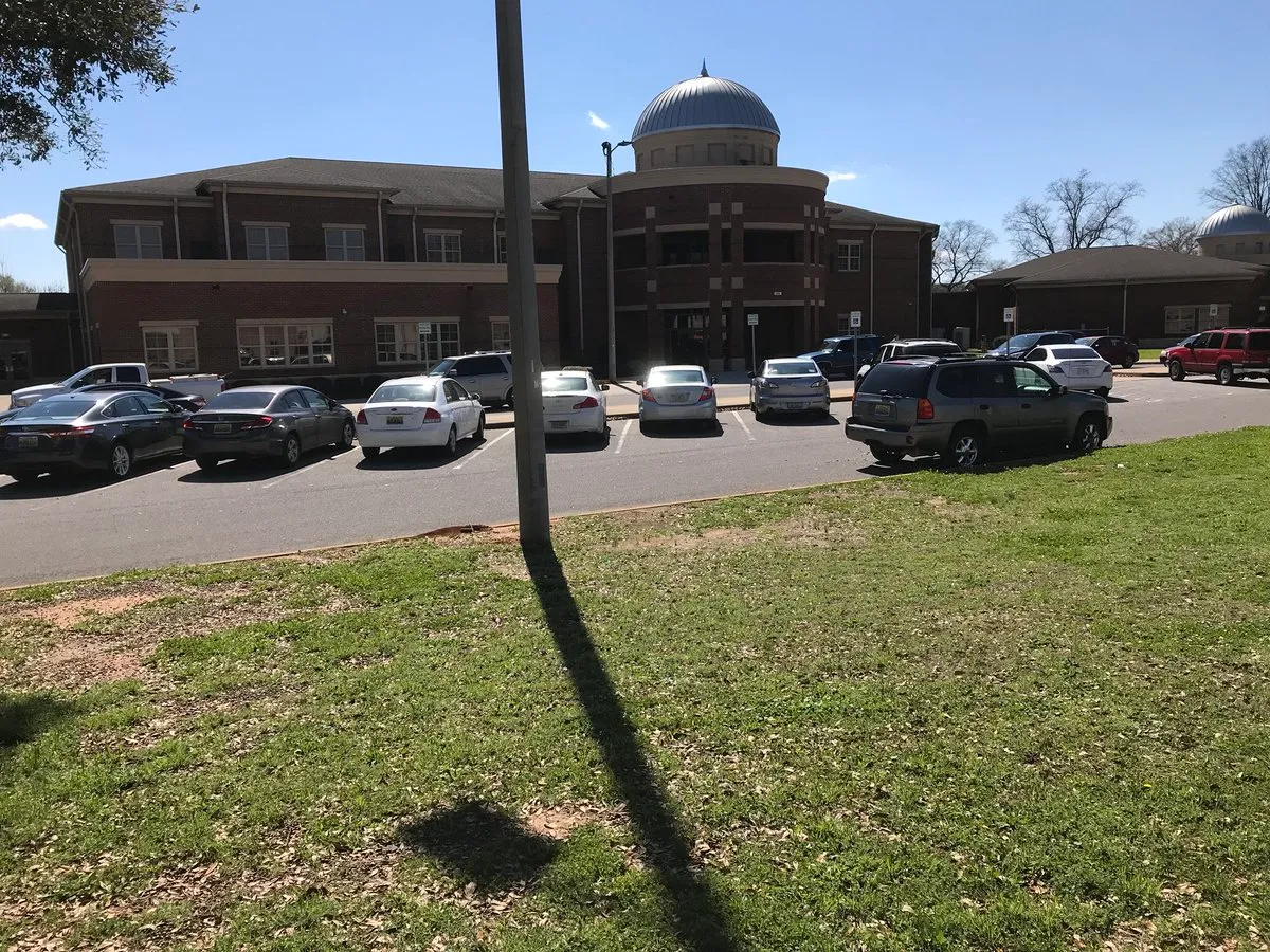 the front of Central High School - recognizable features include a silver dome.