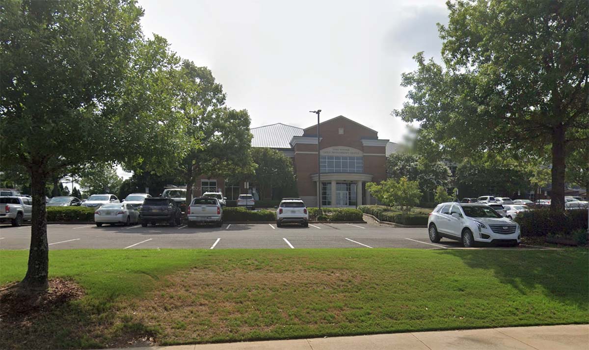 Lot C - recognizable features are the Child Development Center building in the background